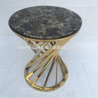 Small round rose gold stainless steel coffee table tempered glass top